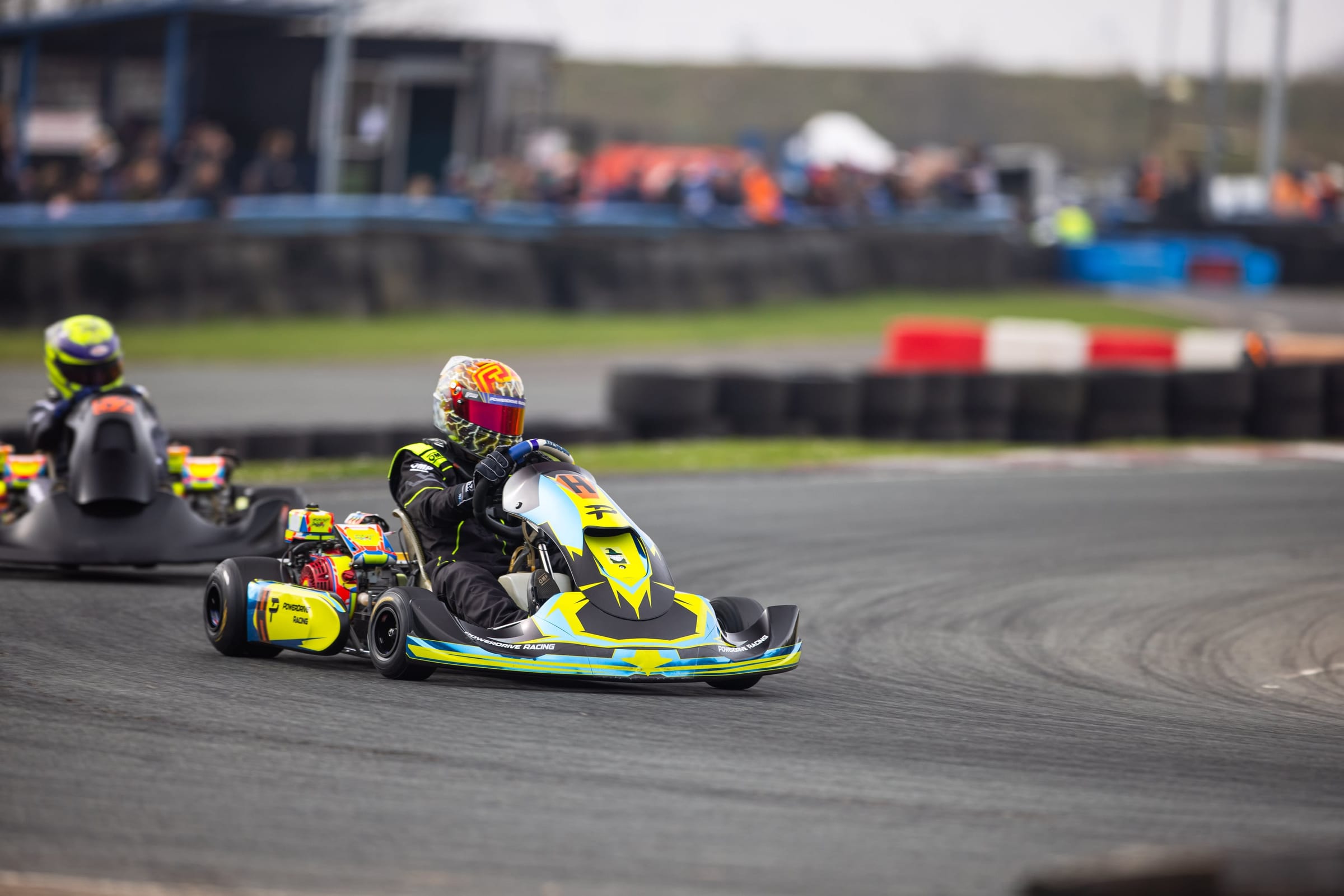 Peter Webster racing his kart through a corner