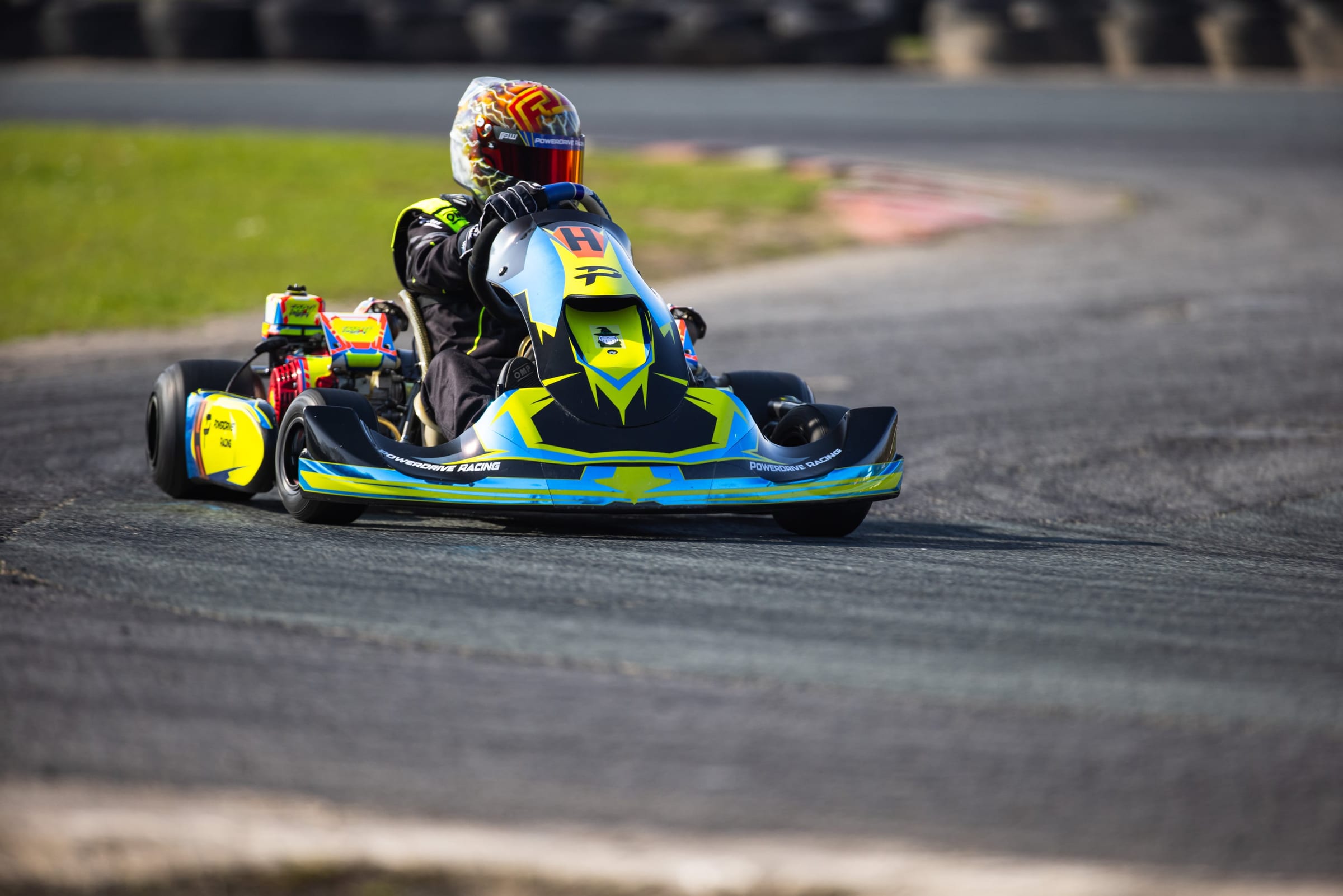Peter Webster driving flat out through a karting corner